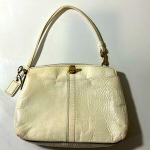 Coach wristlet eggshell leather